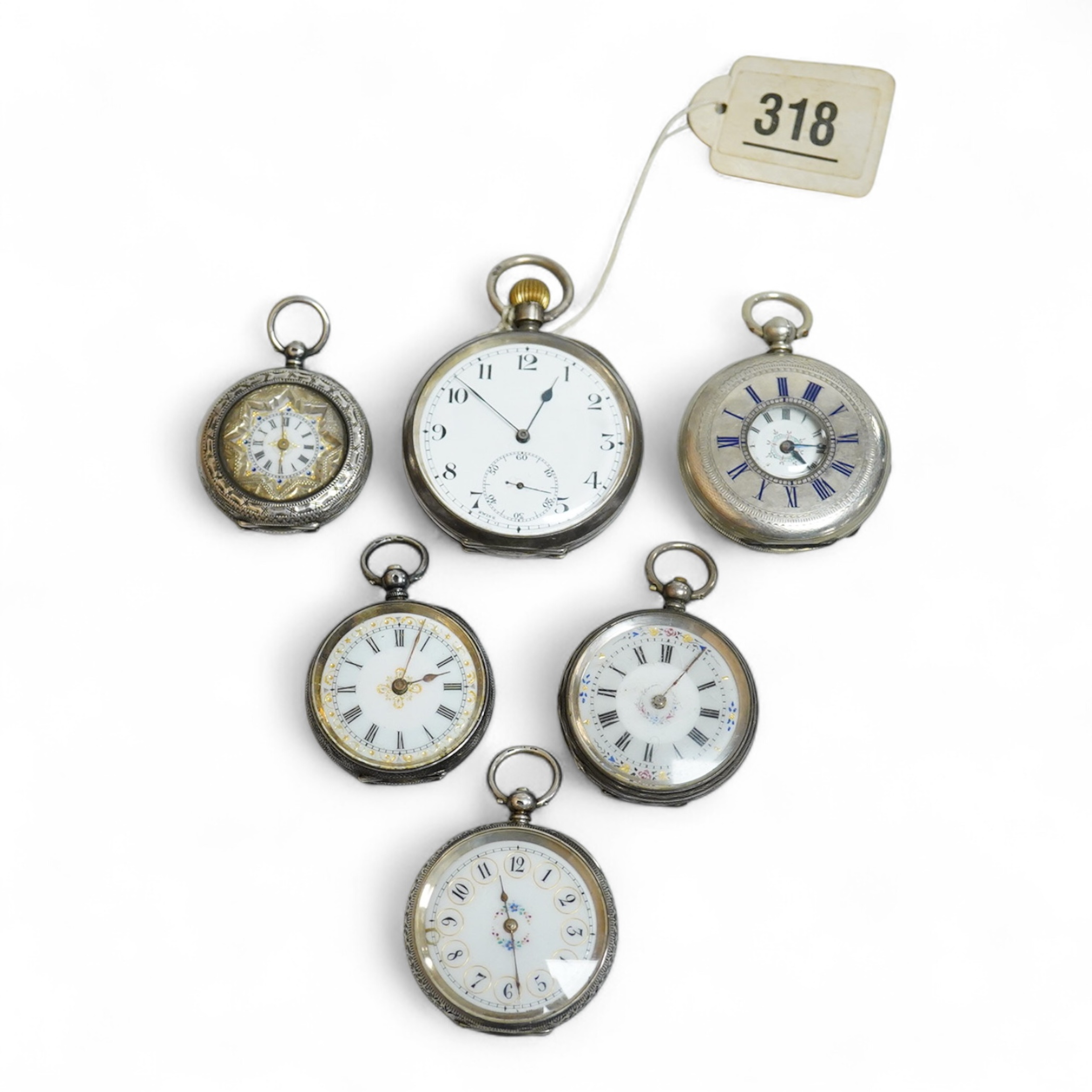 An early 20th century silver open faced pocket watch, with Arabic dial and subsidiary seconds, together with four other white metal open faced fob watches and a white metal half hunter pocket watch, case diameter 44mm.